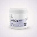 A white plastic jar of Radeq Lab Sugar Paste Classic Line, featuring a white lid and a white label with a light lavender band and black text.