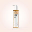 A bottle of Radeq Lab Ingrown S3 Serum with a white pump dispenser and a white label, containing a golden-amber liquid, set against a soft, pale peach-pink gradient background.