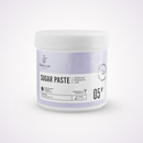 A white plastic jar of Radeq Lab Sugar Paste, Premium Prebiotic Line, with a light lavender label and black text, set against a clean white background.